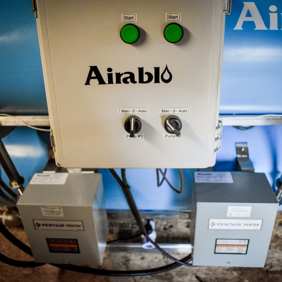 Maple Syrup Pump Control Panel at Graves Maple Products
Close-up of the Airablo control system used in the maple syrup production process, showing manual and automatic settings for dual pumps, with Pentair Pentek electrical components beneath.
