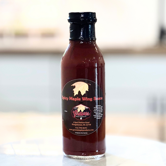 Bottle of spicy maple wing sauce from Graves Maple Products with sweet and bold heat