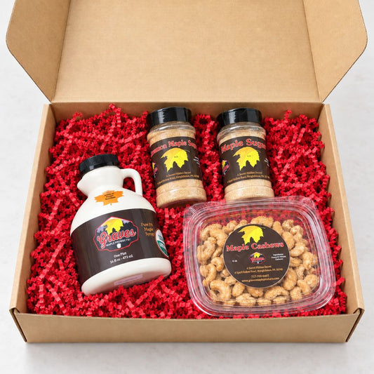 Maple Mornings gift box from Graves Maple Products with one-pint pure maple syrup, cinnamon maple sugar, maple sugar, and maple candied cashews.