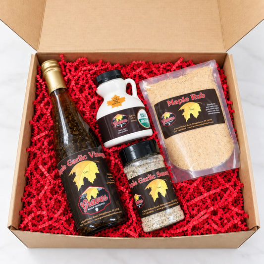 Graves Maple Products The Maple Table gift box with half-pint maple syrup, maple garlic vinegar, garlic seasoning, and maple rub in a kraft gift box.