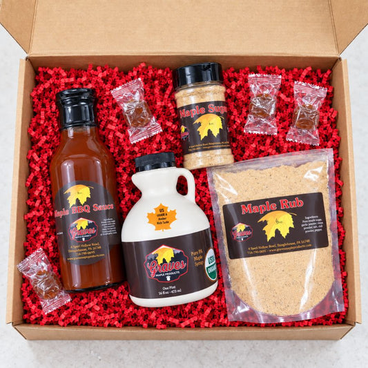 Sugarhouse Favorites gift box from Graves Maple Products with one-pint pure maple syrup, BBQ sauce, maple sugar, maple rub, and wrapped candies.