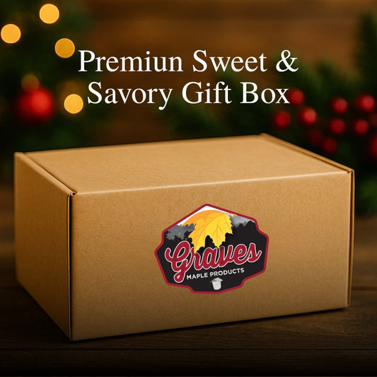 Large maple gift box with Graves Maple Products label on a holiday-themed rustic wood background.